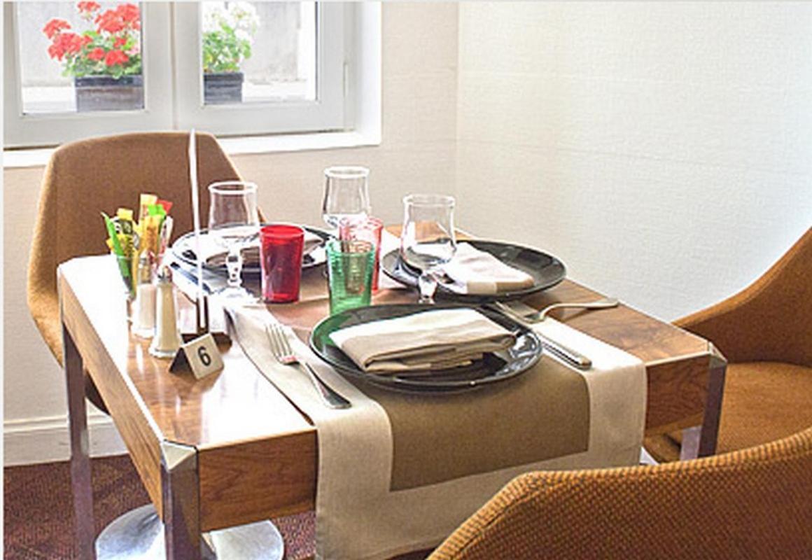 Logis Hotel De France Restaurant Le Lucullus Монморийо Екстериор снимка